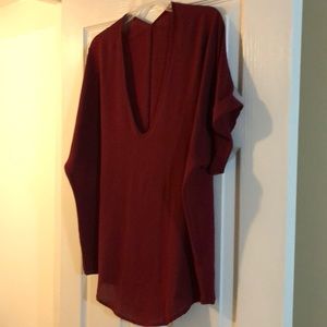 Short sleeved, light weight, low cut tunic blouse!